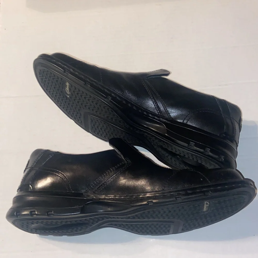 Clarks Escalate black slip on loafers size 10M with original box.